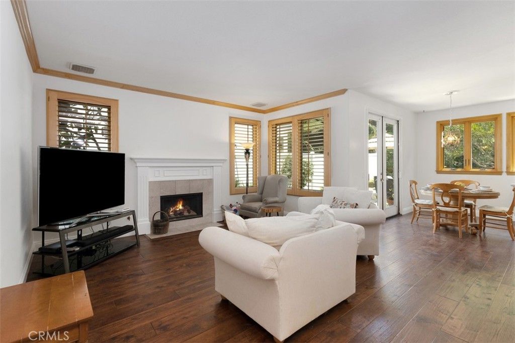 Dining room, Fireplace, Interior, Living room, Pendant Lights, Wood Texture Flooring
