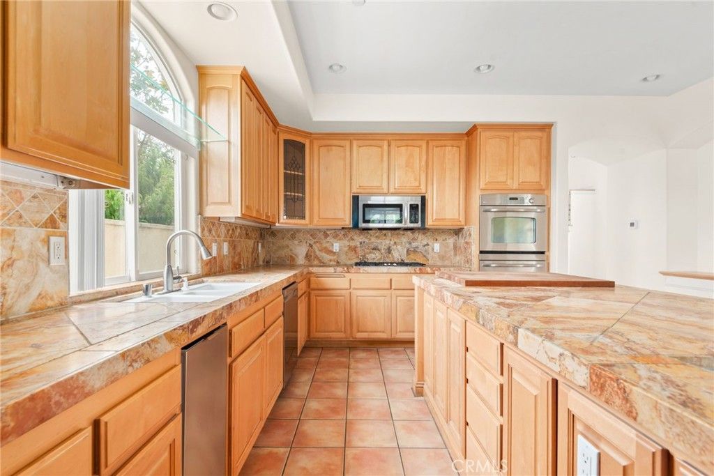 Interior, Kitchen, Recessed Lighting, Stainless Steel Appliances, Tile Countertops
