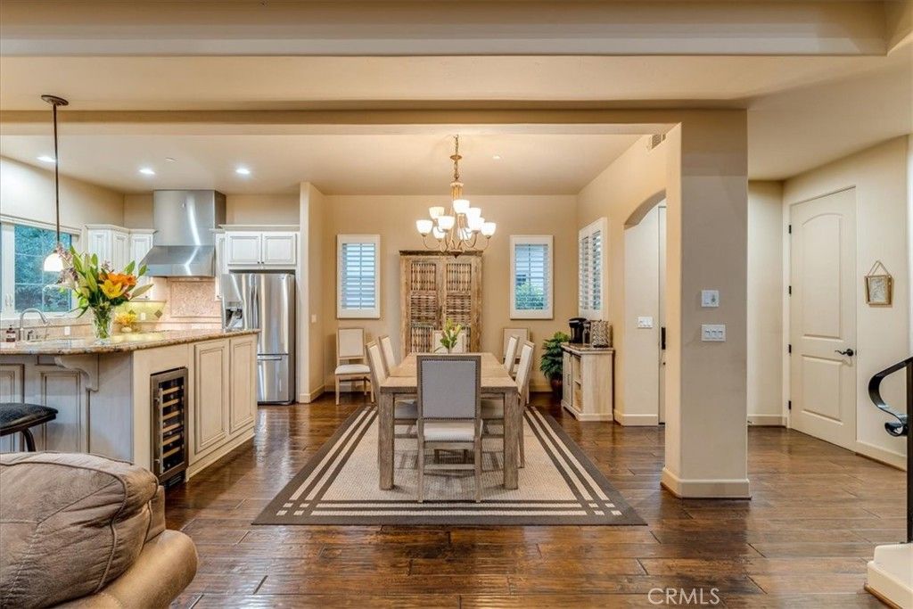 Chandelier, Dining room, Interior, Kitchen, Pendant Lights, Recessed Lighting, Stainless Steel Appliances, Wood Texture Flooring