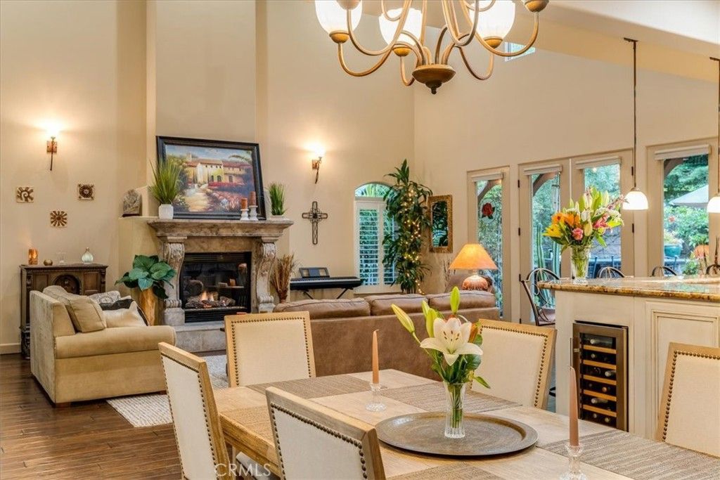 Chandelier, Dining room, Fireplace, Interior, Living room, Pendant Lights, Wood Texture Flooring