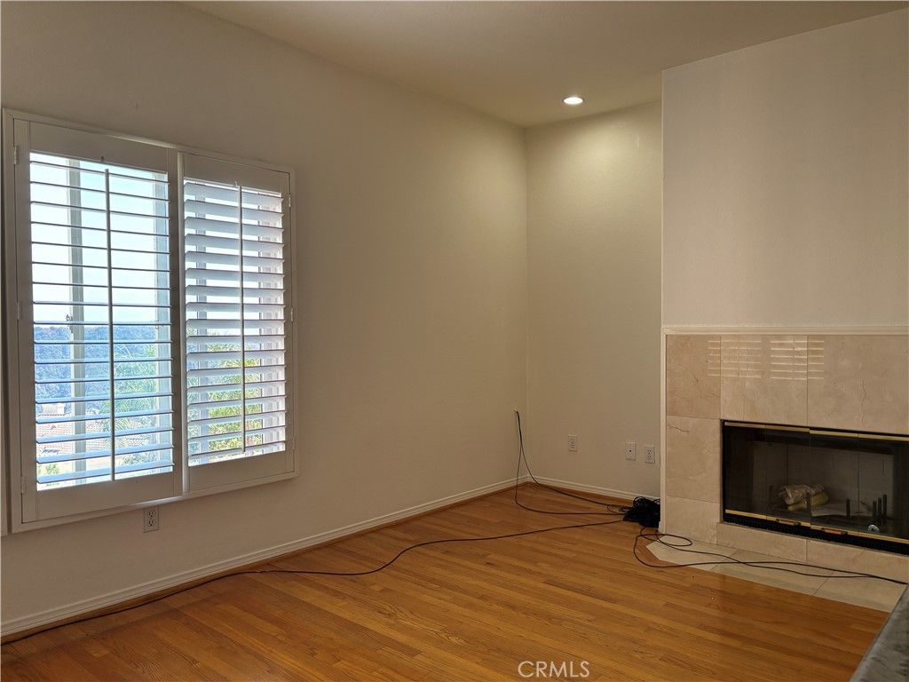 Empty room, Fireplace, Interior, Recessed Lighting, Wood Texture Flooring
