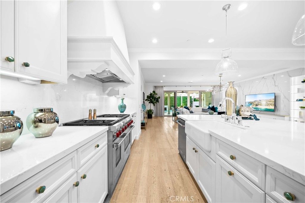 Interior, Kitchen, Marble Walls, Pendant Lights, Recessed Lighting, Stainless Steel Appliances, Wood Texture Flooring