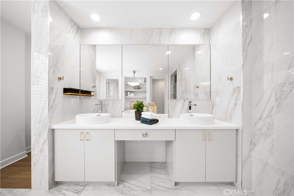 Bathroom, Dual Sink Vanities, Interior, Marble, Marble Walls, Pendant Lights, Recessed Lighting