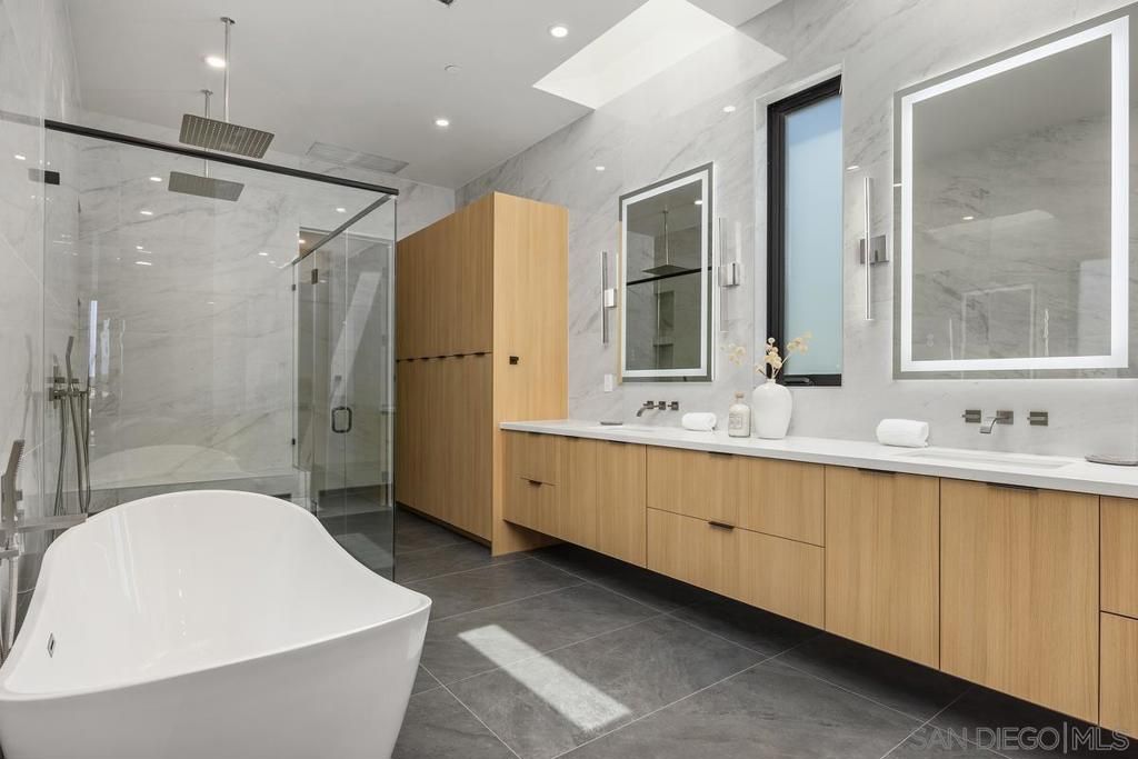 Bathroom, Dual Sink Vanities, Free Standing Baths, Glass Shower, Interior, Marble Walls, Recessed Lighting