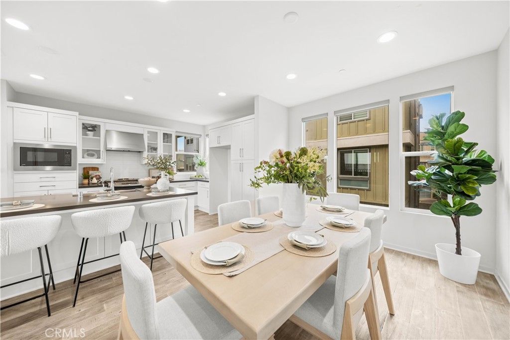 Dining room, Interior, Kitchen, Recessed Lighting, Stainless Steel Appliances, Wood Texture Flooring
