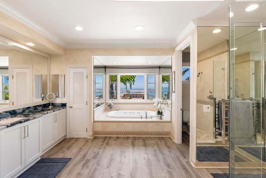 Bathroom, Dual Sink Vanities, Glass Shower, Interior, Recessed Lighting, Water, Wood Texture Flooring