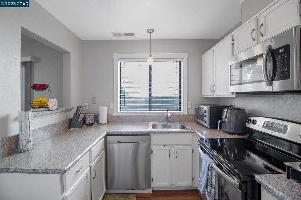 Interior, Kitchen, Pendant Lights, Stainless Steel Appliances, Wood Texture Flooring