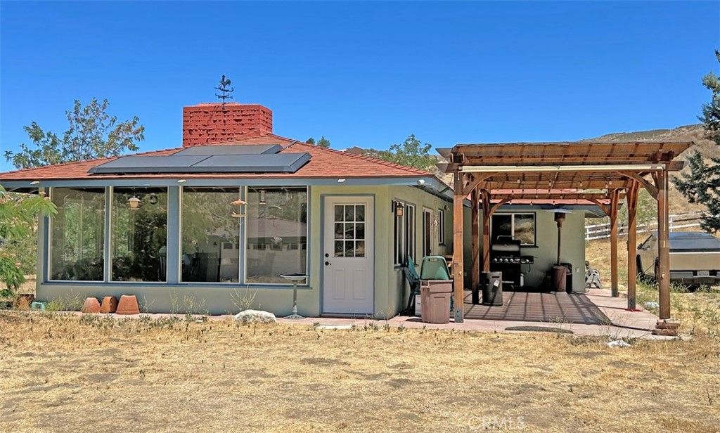 Exterior, Hot Tub, Solar Panels