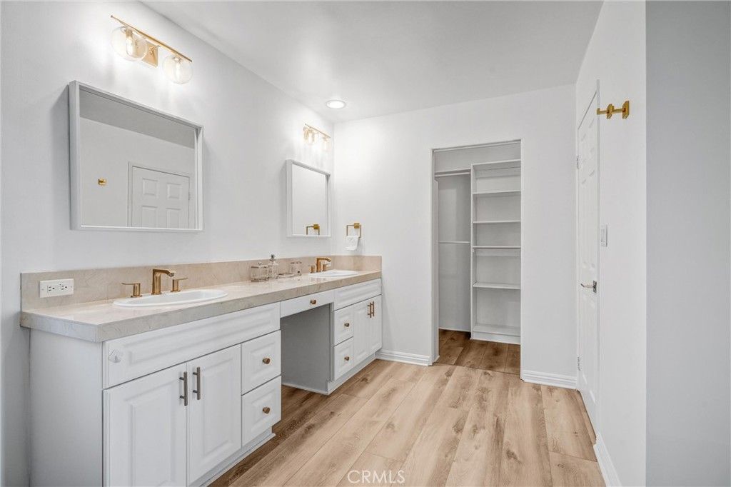 Bathroom, Dual Sink Vanities, Interior, Recessed Lighting, Wood Texture Flooring