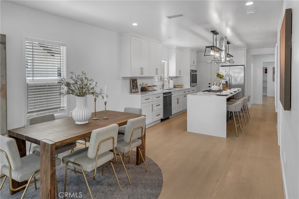 Dining room, Interior, Kitchen, Pendant Lights, Recessed Lighting, Stainless Steel Appliances, Wood Texture Flooring