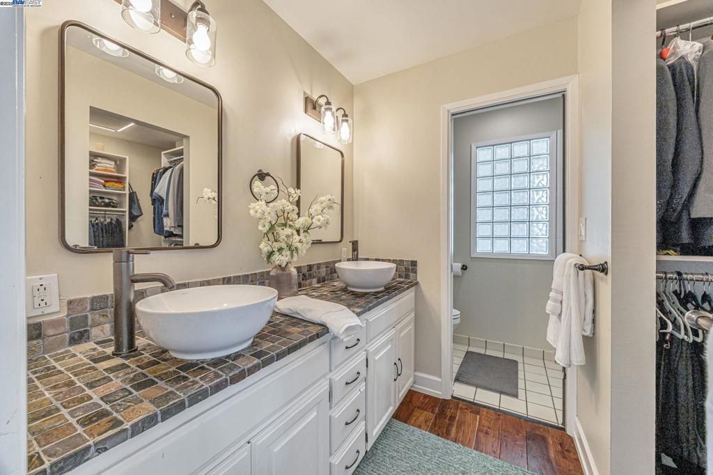 Bathroom, Dual Sink Vanities, Interior, Tile Countertops, Wood Texture Flooring