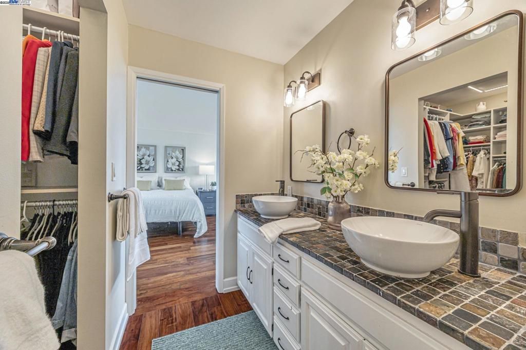 Bathroom, Bedroom, Dual Sink Vanities, Interior, Tile Countertops, Wood Texture Flooring