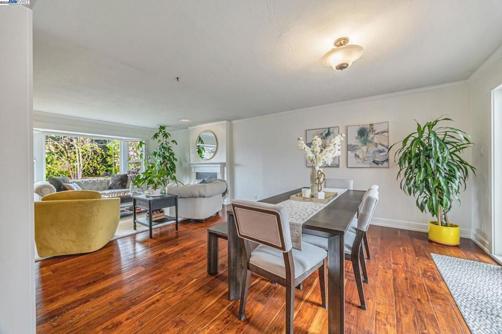 Dining room, Fireplace, Interior, Living room, Recessed Lighting, Wood Texture Flooring