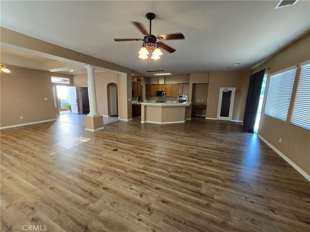Empty room, Interior, Kitchen, Stainless Steel Appliances, Wood Texture Flooring