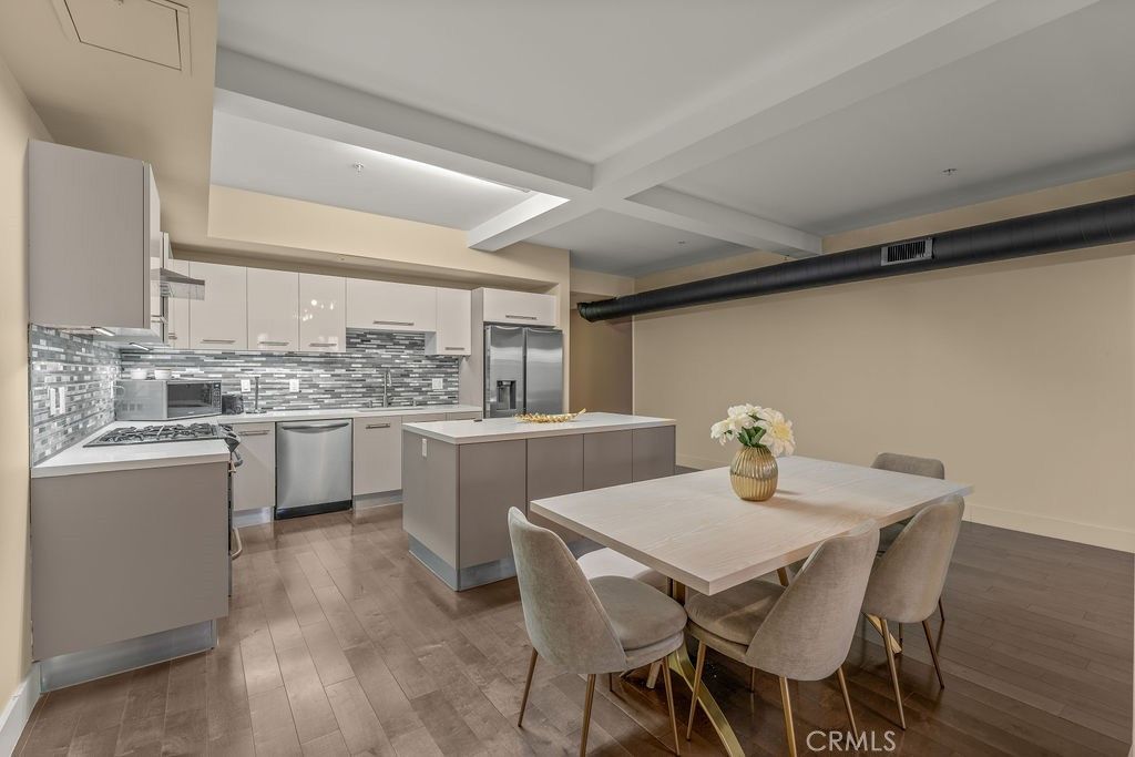 Dining room, Interior, Kitchen, Recessed Lighting, Stainless Steel Appliances, Wood Texture Flooring