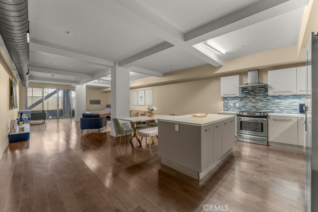 Dining room, Interior, Kitchen, Recessed Lighting, Stainless Steel Appliances, Wood Texture Flooring