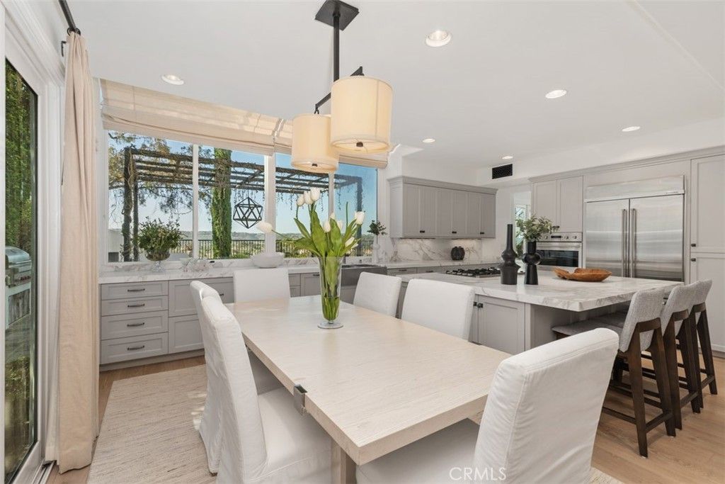 Dining room, Interior, Kitchen, Recessed Lighting, Stainless Steel Appliances, Wood Texture Flooring