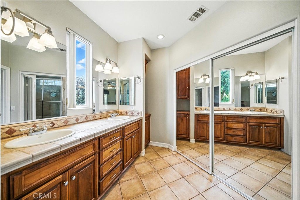 Bathroom, Dual Sink Vanities, Interior, Recessed Lighting, Tile Countertops