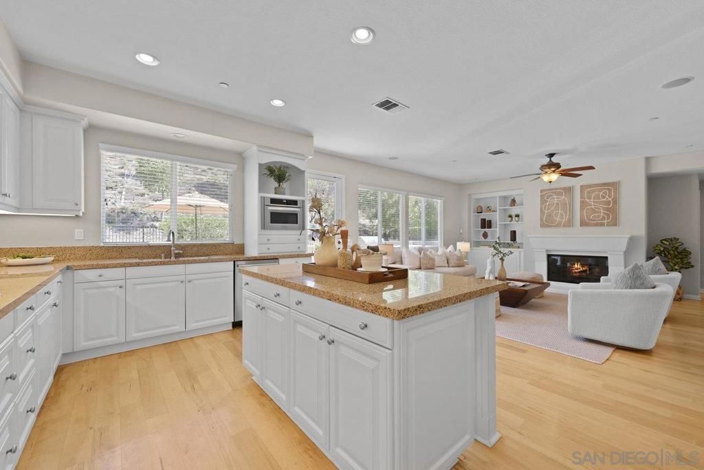 Fireplace, Interior, Kitchen, Living room, Recessed Lighting, Wood Texture Flooring