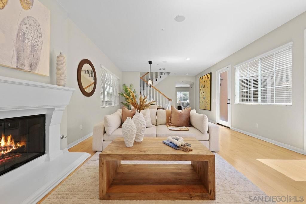Dining room, Fireplace, Interior, Living room, Pendant Lights, Recessed Lighting, Wood Texture Flooring