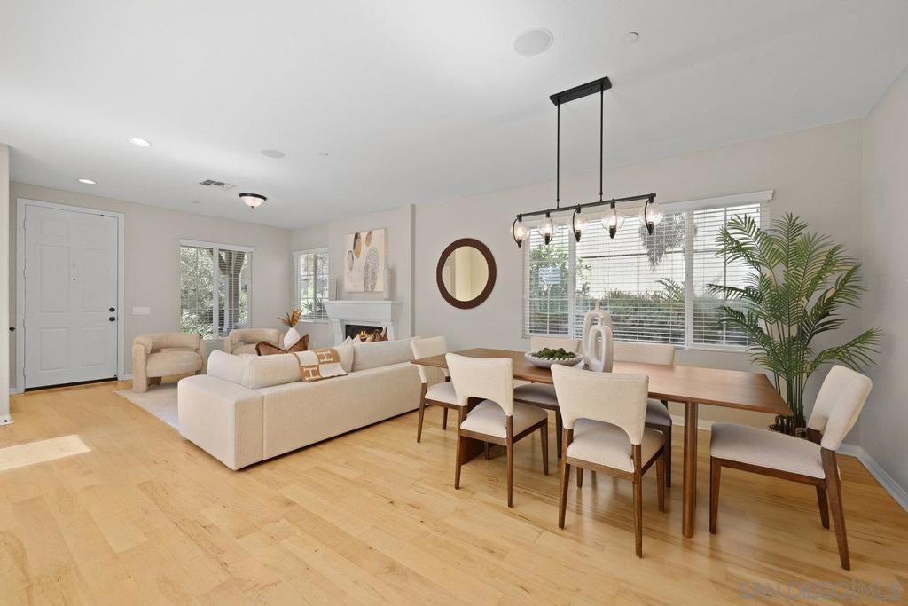 Dining room, Fireplace, Interior, Living room, Pendant Lights, Recessed Lighting, Wood Texture Flooring