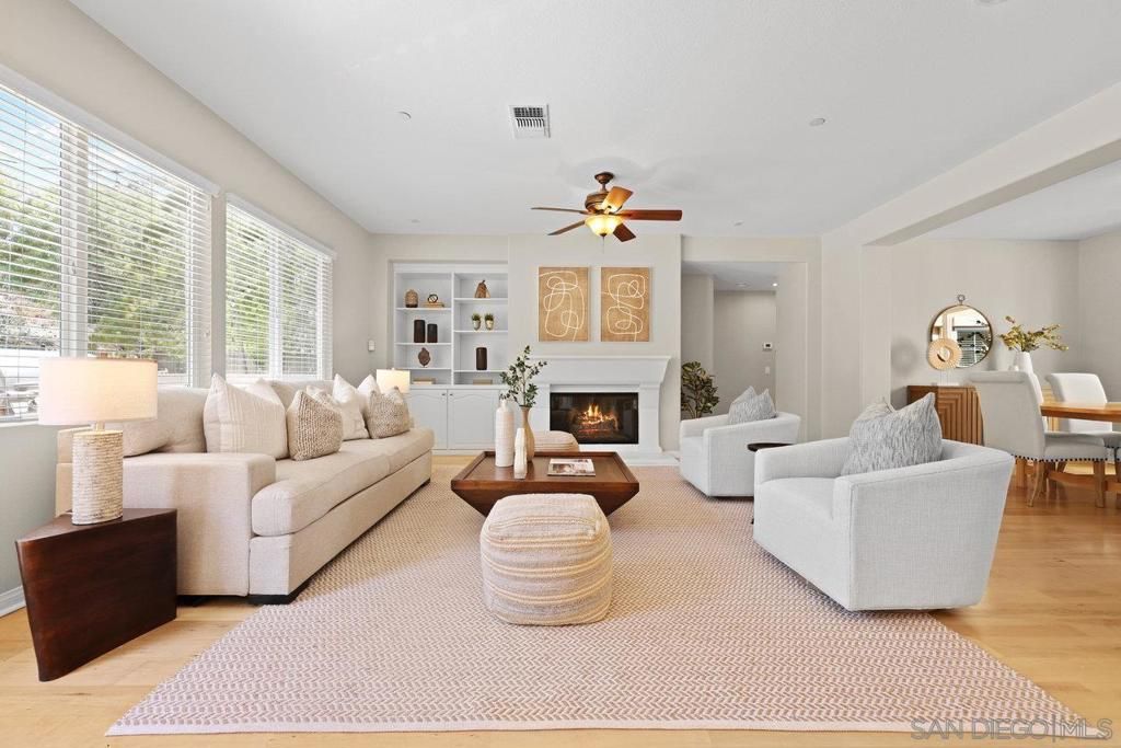 Dining room, Fireplace, Interior, Living room, Recessed Lighting, Wood Texture Flooring