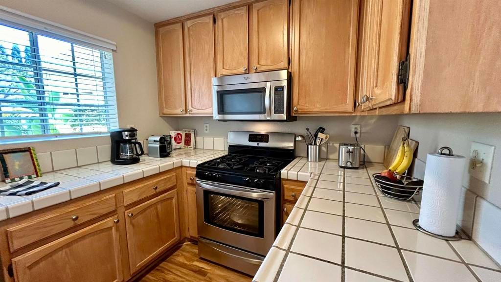 Interior, Kitchen, Tile Countertops, Wood Texture Flooring