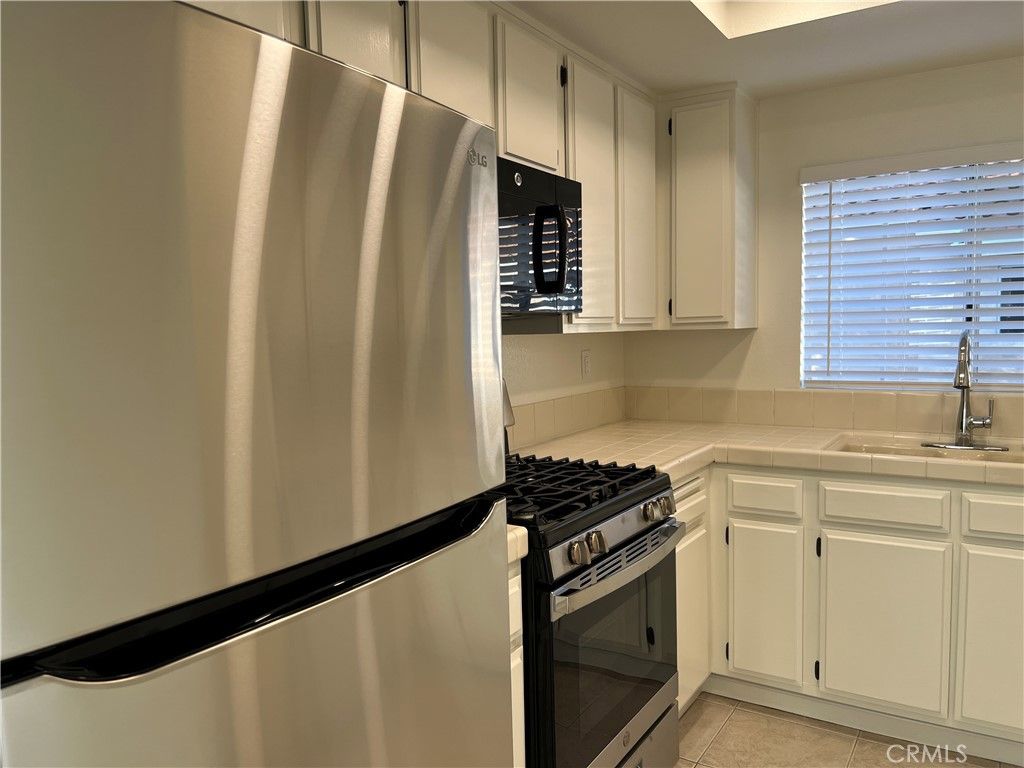 Interior, Kitchen, Stainless Steel Appliances, Tile Countertops