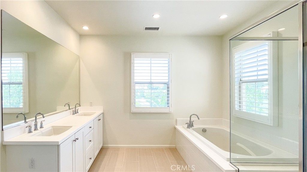Bathroom, Dual Sink Vanities, Interior, Recessed Lighting, Wood Texture Flooring