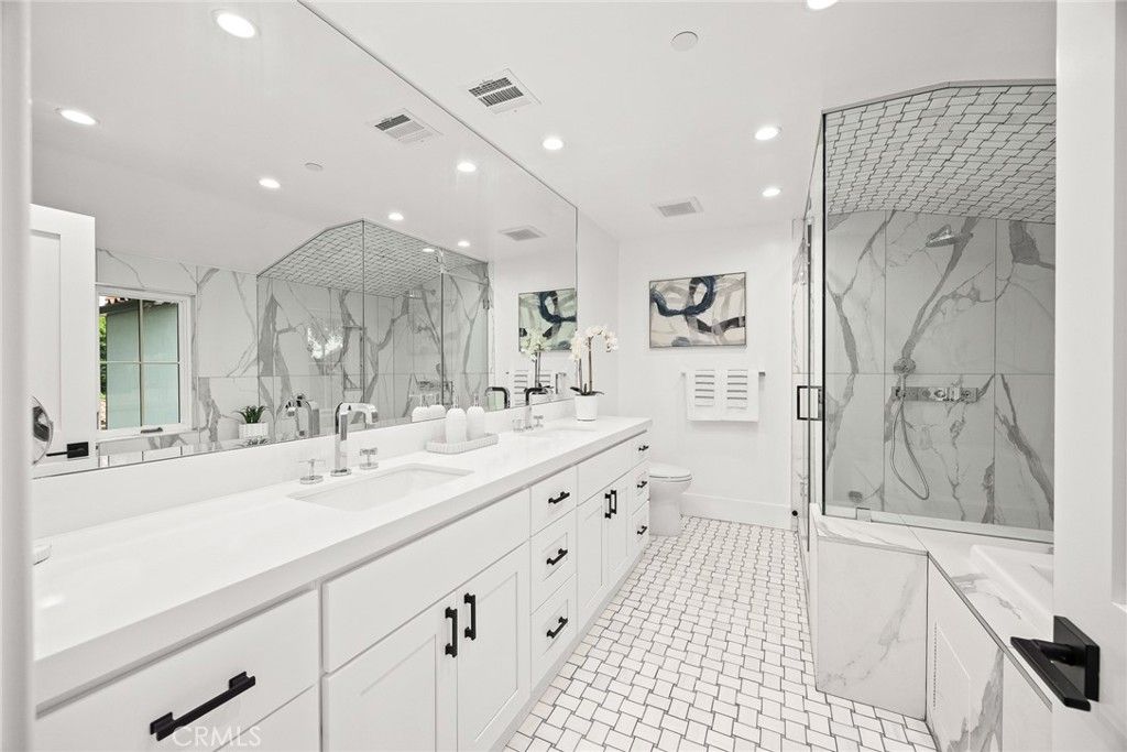 Bathroom, Dual Sink Vanities, Glass Shower, Interior, Marble, Marble Walls, Recessed Lighting
