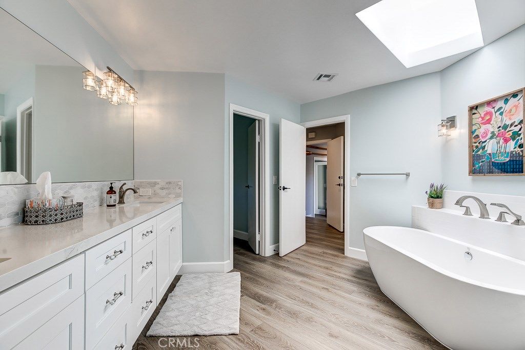 Bathroom, Dual Sink Vanities, Free Standing Baths, Interior, Wood Texture Flooring