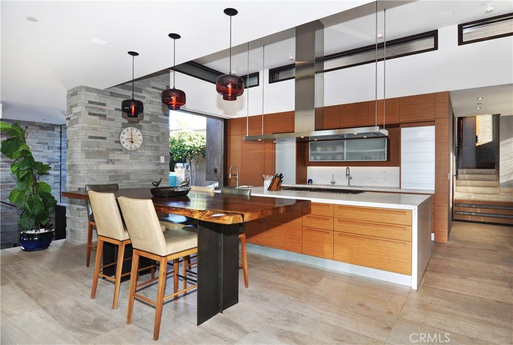 Dining room, Interior, Kitchen, Pendant Lights, Recessed Lighting, Stainless Steel Appliances, Stone Walls, Wood Texture Flooring