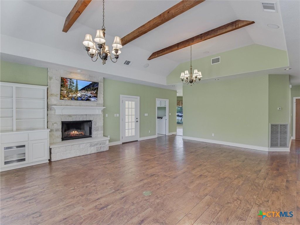 Chandelier, Empty room, Fireplace, Interior, Wooden Beams, Wood Texture Flooring