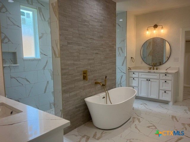 Bathroom, Dual Sink Vanities, Free Standing Baths, Interior, Marble, Marble Walls