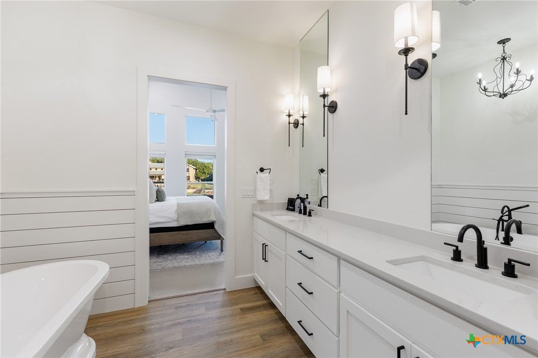 Bathroom, Bedroom, Chandelier, Dual Sink Vanities, Interior, Wood Texture Flooring