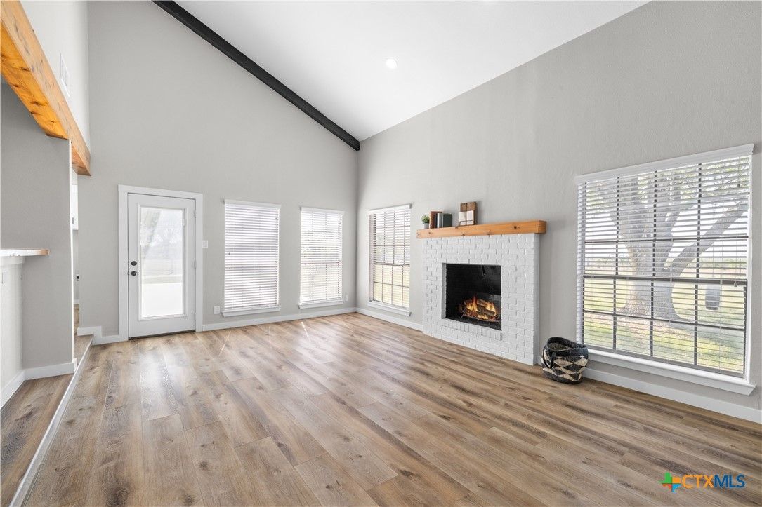 Empty room, Fireplace, Interior, Recessed Lighting, Wood Texture Flooring
