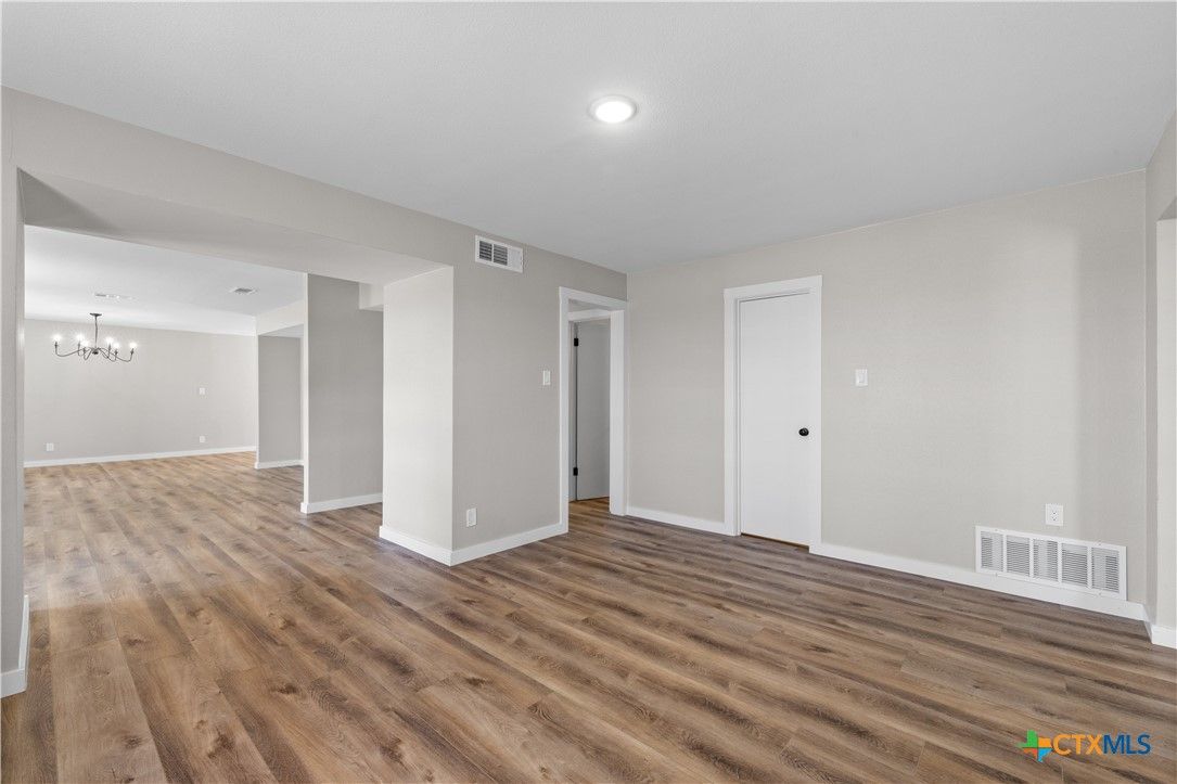 Chandelier, Empty room, Interior, Recessed Lighting, Wood Texture Flooring