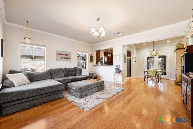 Chandelier, Dining room, Interior, Living room, Pendant Lights, Recessed Lighting, Wood Texture Flooring