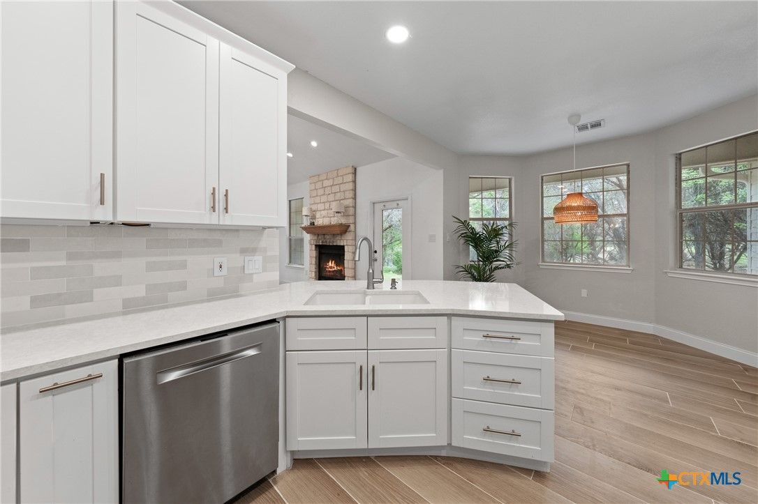 Fireplace, Interior, Kitchen, Pendant Lights, Recessed Lighting, Wood Texture Flooring