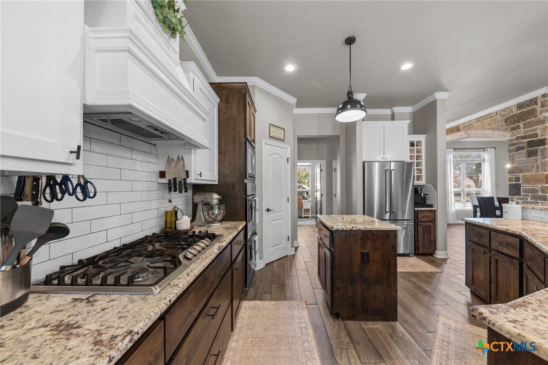 Interior, Kitchen, Pendant Lights, Recessed Lighting, Stainless Steel Appliances, Stone Walls, Wood Texture Flooring
