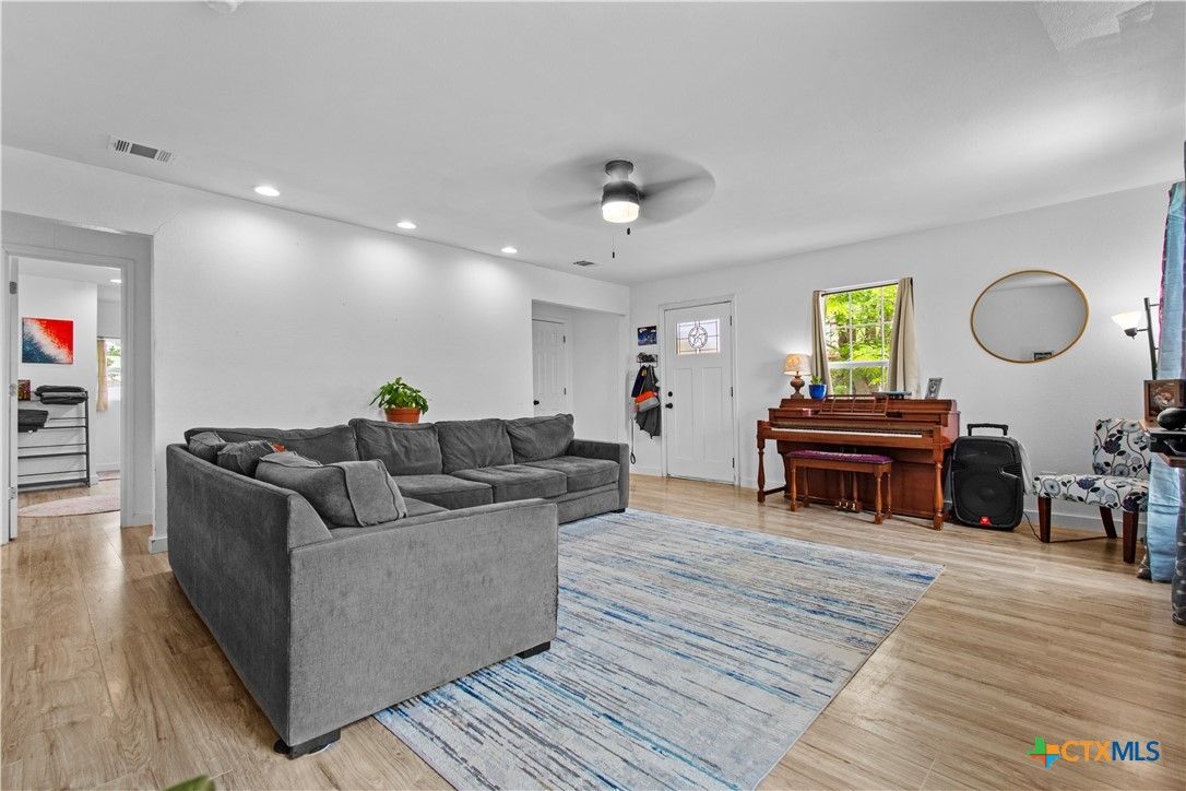 Interior, Living room, Piano, Recessed Lighting, Wood Texture Flooring