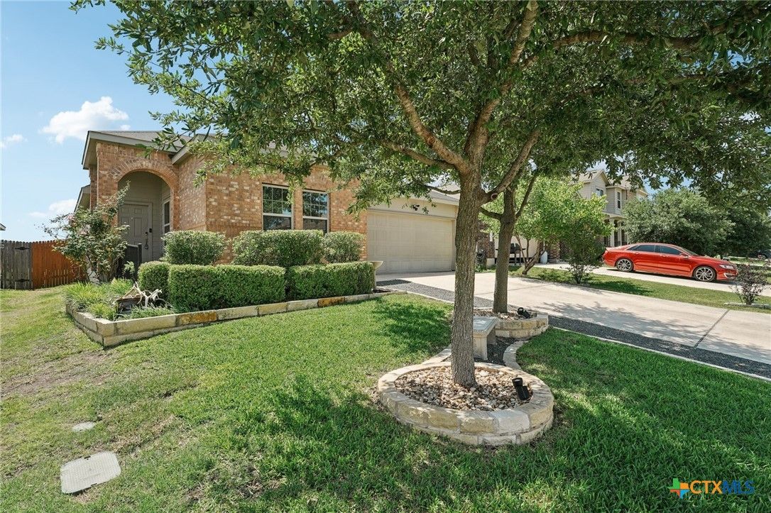 Attached, Backyard, Exterior, Facade, Brick Facade, None