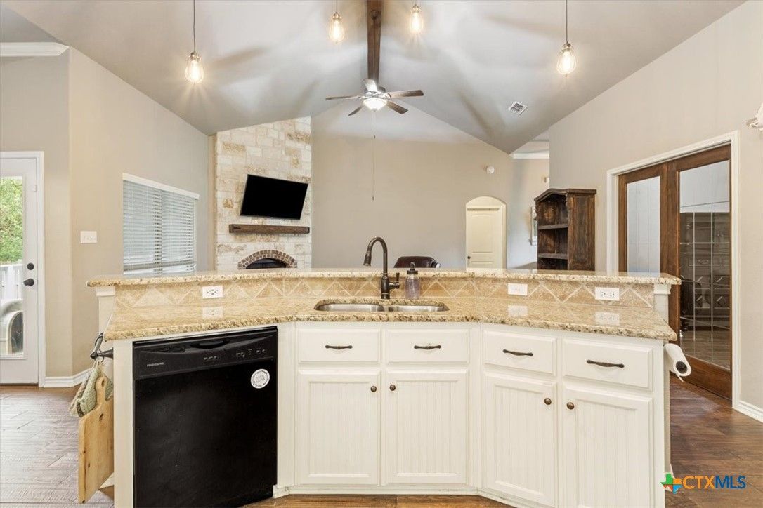 Fireplace, Interior, Kitchen, Pendant Lights, Recessed Lighting, Stone Walls, Wood Texture Flooring