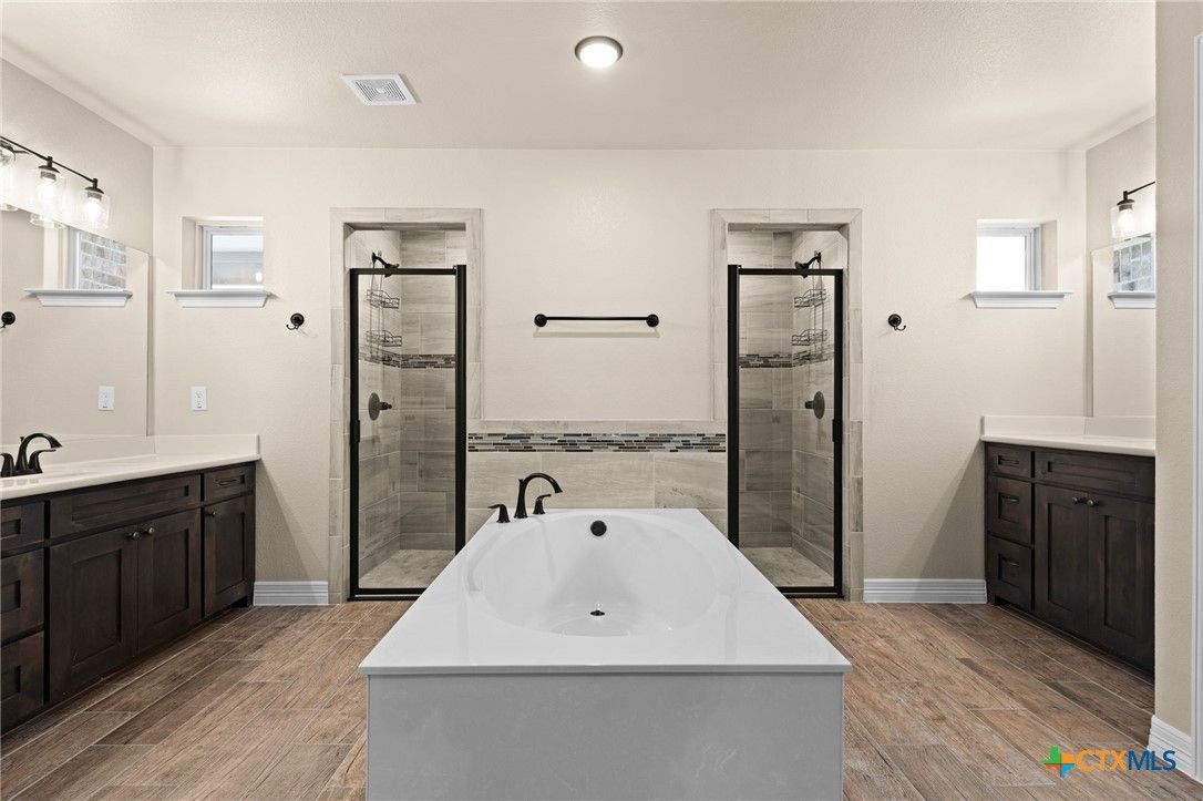 Bathroom, Dual Sink Vanities, Glass Shower, Interior, Recessed Lighting, Wood Texture Flooring