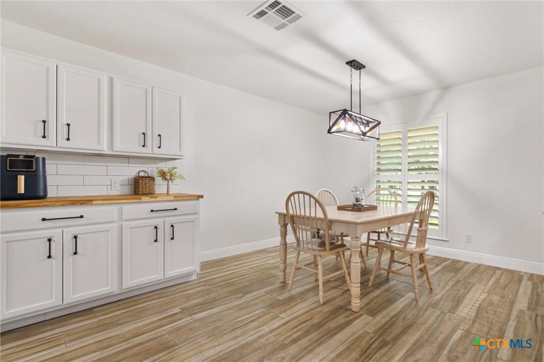 Dining room, Interior, Pendant Lights, Wood Texture Flooring