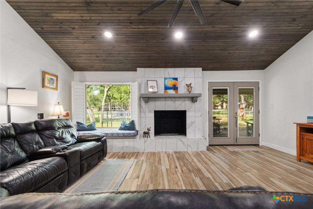 Fireplace, Interior, Living room, Recessed Lighting, Wooden Ceilings, Wood Texture Flooring