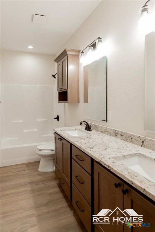 Bathroom, Dual Sink Vanities, Interior, Recessed Lighting, Wood Texture Flooring
