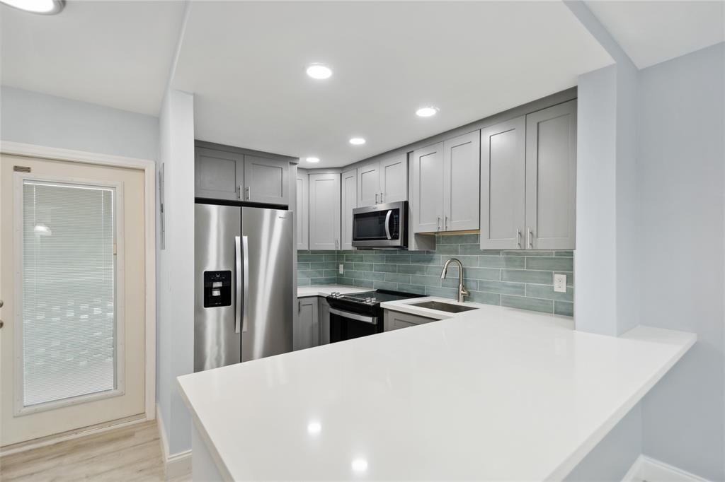 Interior, Kitchen, Recessed Lighting, Stainless Steel Appliances, Wood Texture Flooring