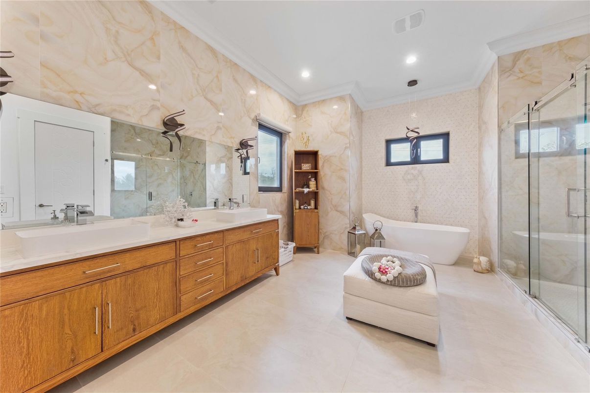 Bathroom, Dual Sink Vanities, Free Standing Baths, Glass Shower, Interior, Marble Walls, Pendant Lights, Recessed Lighting