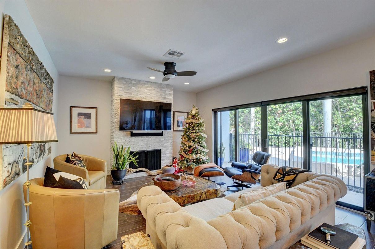 Fireplace, Interior, Living room, Recessed Lighting, Stone Walls, Wood Texture Flooring